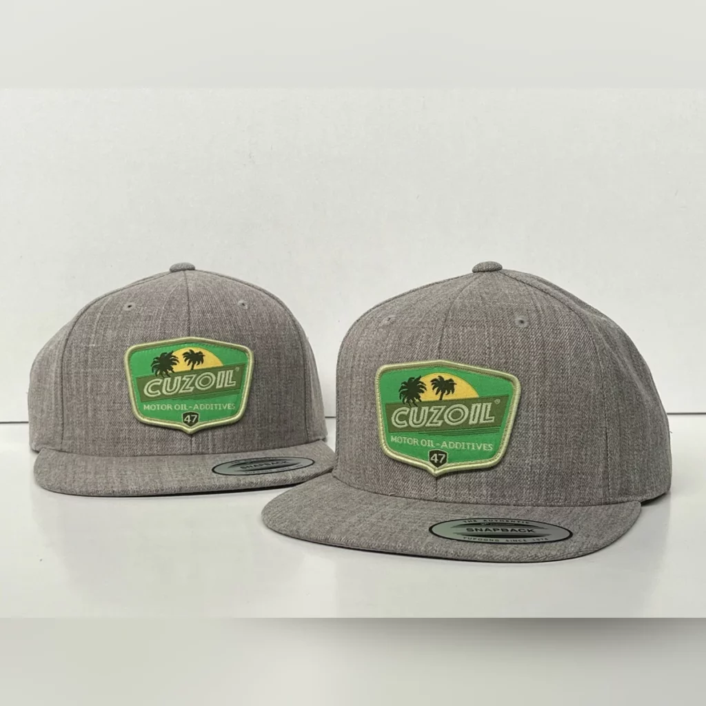Casquettes snapback gris chiné avec un patch tissé vert Cuzoil